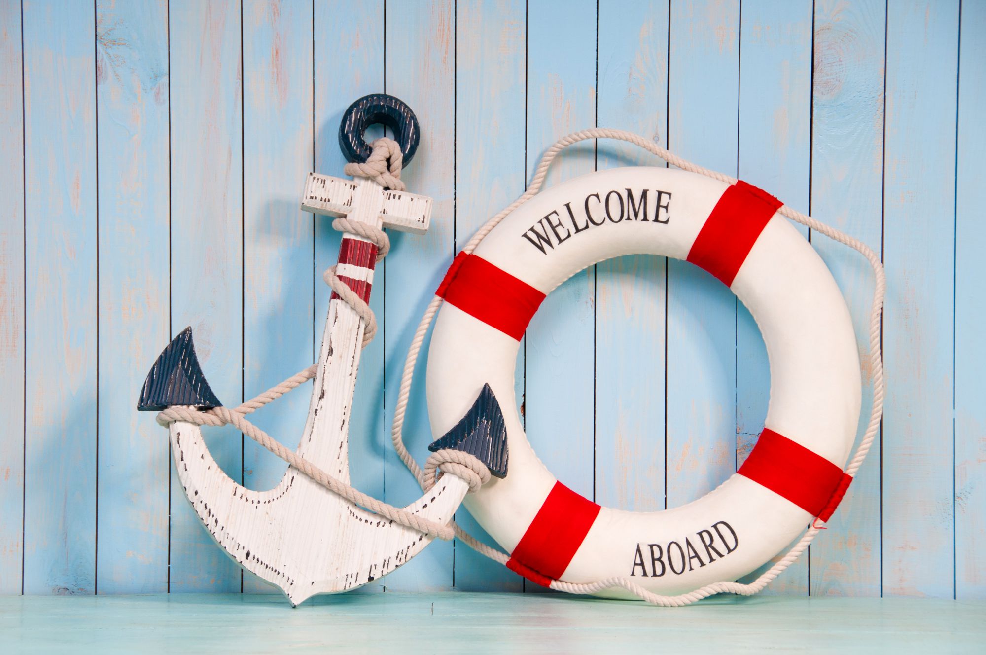 Welcome Aboard life preserver and anchor.